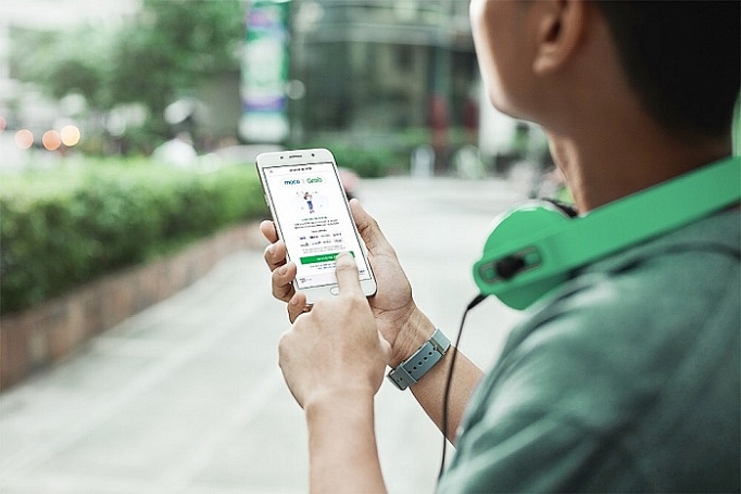 grab hop tac cung vietcombank mo rong cac trai nghiem thanh toan